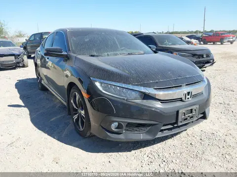 2017 Honda Civic Touring VIN 2HGFC1F9XHH100855 фото 1