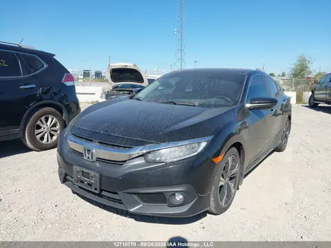 2017 Honda Civic Touring VIN 2HGFC1F9XHH100855 фото 2