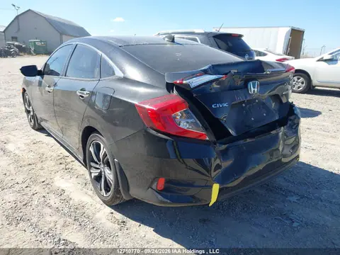 2017 Honda Civic Touring VIN 2HGFC1F9XHH100855 фото 3