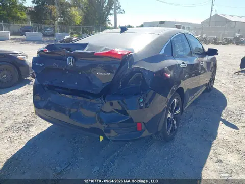 2017 Honda Civic Touring VIN 2HGFC1F9XHH100855 фото 4