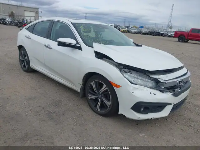 2HGFC1F99HH100152 — 2017 Honda Civic Touring, Передняя часть (Front), фото до ремонта