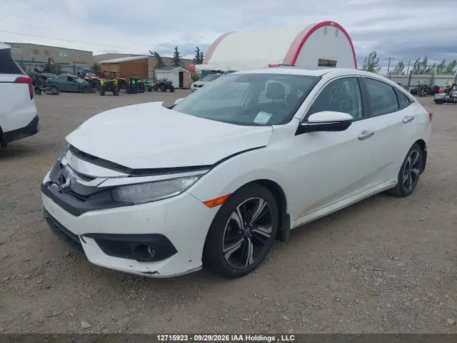 2HGFC1F99HH100152 — 2017 Honda Civic Touring, фото 2 с аукциона IAAI 14.10.2026, Передняя часть