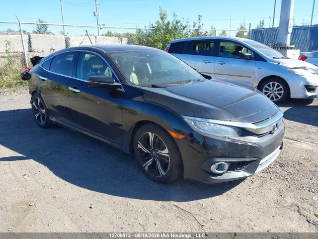 2018 Honda Civic Touring VIN 2HGFC1F96JH106335 фото 1
