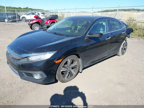2018 Honda Civic Touring VIN 2HGFC1F96JH106335 фото 2