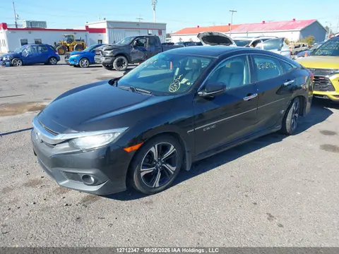 2018 Honda Civic Touring VIN 2HGFC1F90JH104581 фото 2