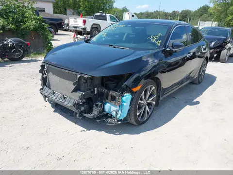 2021 Honda Civic Touring VIN 2HGFC1F9XMH101045 фото 2