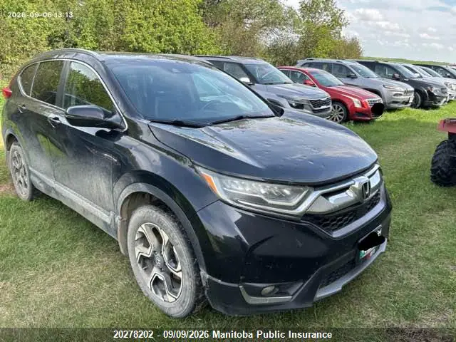 2HKRW2H96HH123479 — 2017 Honda CR-V Touring, Град (Hail), фото до ремонта