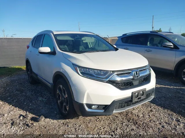 2018 Honda Cr-v Touring VIN 2HKRW2H9XJH133910 фото 1