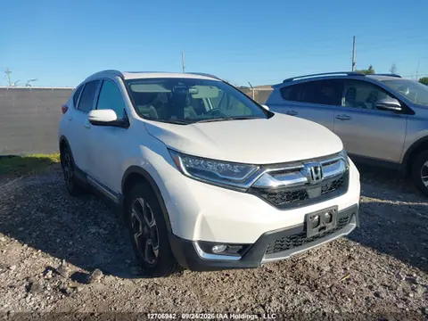 2018 Honda Cr-v Touring VIN 2HKRW2H9XJH133910 фото 1