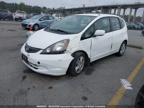 2014 Honda Fit VIN LUCGE8H59E3000160 фото 2