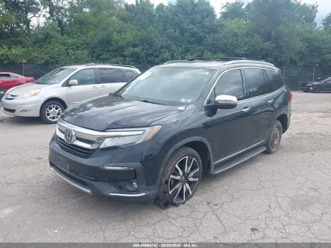 2019 Honda Pilot Elite VIN 5FNYF6H0XKB019801 фото 2