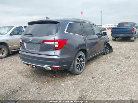 2022 Honda Pilot Touring VIN 5FNYF6H6XNB500527 фото 4
