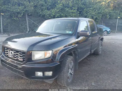 2014 Honda Ridgeline Sport VIN 5FPYK1F73EB009637 фото 2