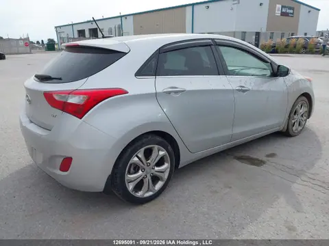 2014 Hyundai ELANTRA GT VIN KMHD35LH4EU205422 фото 4