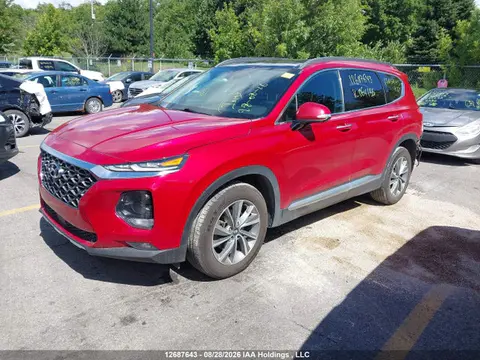 2019 Hyundai Santa Fe Luxury VIN 5NMS3CAA1KH064155 фото 2