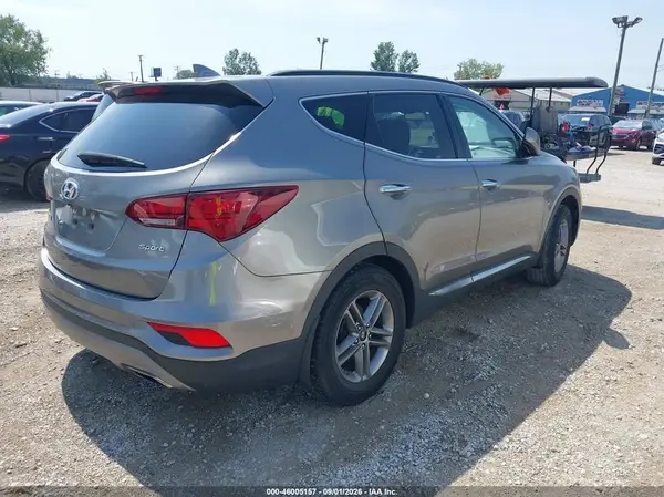 5NMZU3LB5HH005555 — 2017 Hyundai Santa FE, фото 4 с аукциона IAAI 13.10.2026, Задняя часть слева