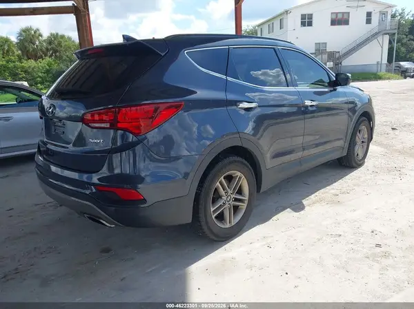 5NMZU3LB2HH006064 — 2017 Hyundai Santa FE, фото 4 с аукциона IAAI 06.10.2026, Естественный износ