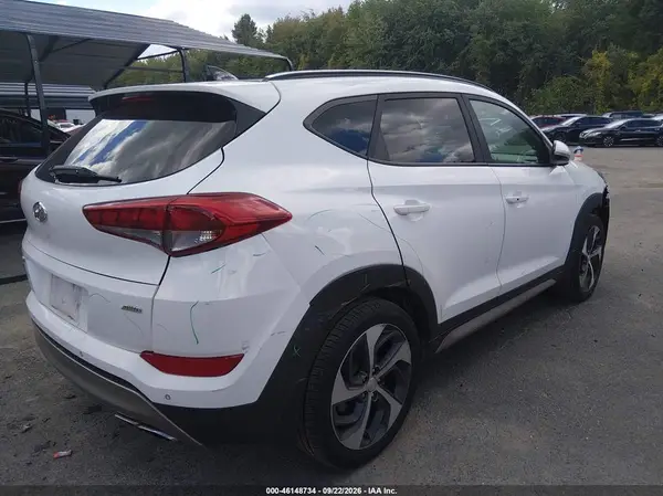 KM8J3CA24JU725619 — 2018 Hyundai Tucson, фото 4 с аукциона IAAI 08.10.2026, Передняя и задняя части