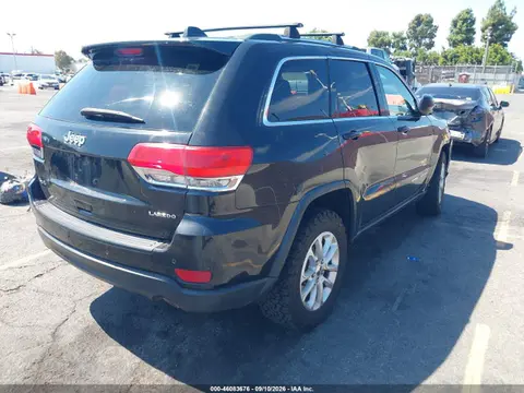 2015 Jeep Grand Cherokee Laredo VIN 1C4RJFAG8FC208105 фото 4