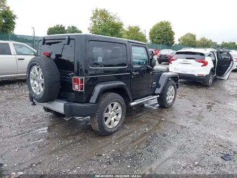 2014 Jeep Wrangler Sahara VIN 1C4GJWBG4EL271867 фото 4