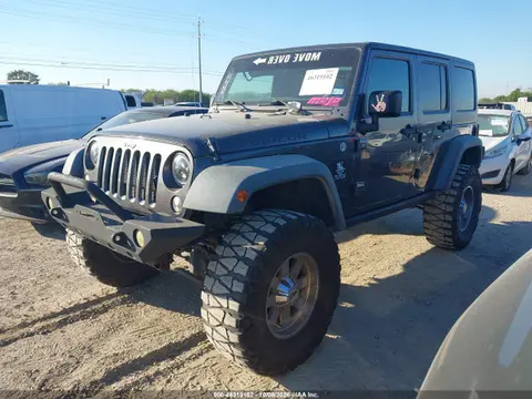 2014 Jeep Wrangler Unlimited Rubicon VIN 1C4BJWFG8EL274887 фото 2