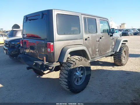 2014 Jeep Wrangler Unlimited Rubicon VIN 1C4BJWFG8EL274887 фото 4