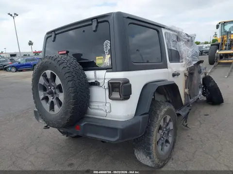2018 Jeep Wrangler Unlimited Sahara 4x4 VIN 1C4HJXEN9JW213573 фото 4