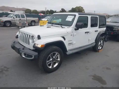 2019 Jeep Wrangler Unlimited Sahara 4x4 VIN 1C4HJXEN6KW614676 фото 2