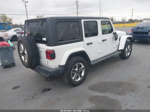 2019 Jeep Wrangler Unlimited Sahara 4x4 VIN 1C4HJXEN6KW614676 фото 4