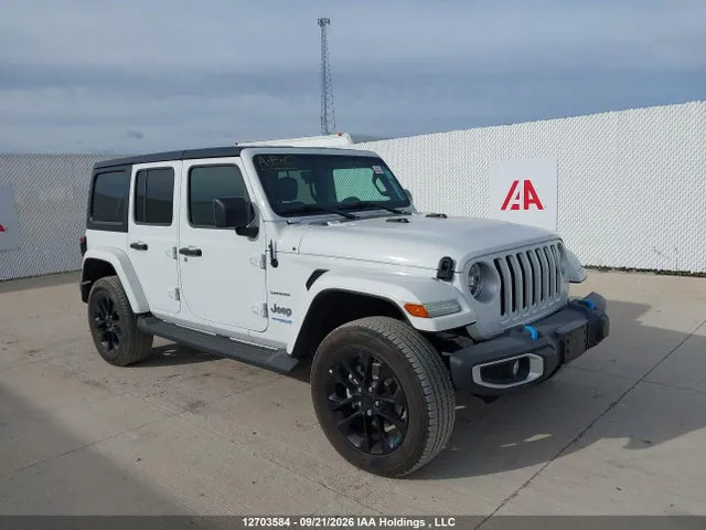 2022 Jeep Wrangler Unlimited Sahara 4xe VIN 1C4JJXP60NW147203 фото 1