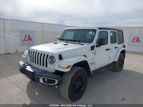 2022 Jeep Wrangler Unlimited Sahara 4xe VIN 1C4JJXP60NW147203 фото 2