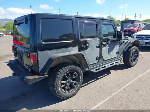 2017 Jeep Wrangler Unlimited Smoky Mountain 4x4 VIN 1C4BJWEG6HL706110 фото 4