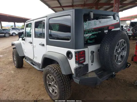 2014 Jeep Wrangler Unlimited Sport VIN 1C4BJWDG2EL194424 фото 3