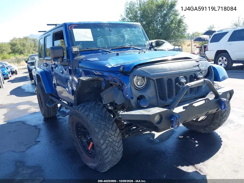 2009 Jeep Wrangler Unlimited Sahara VIN 1J4GA59119L718084 фото 1