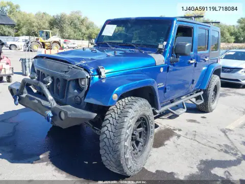 2009 Jeep Wrangler Unlimited Sahara VIN 1J4GA59119L718084 фото 2