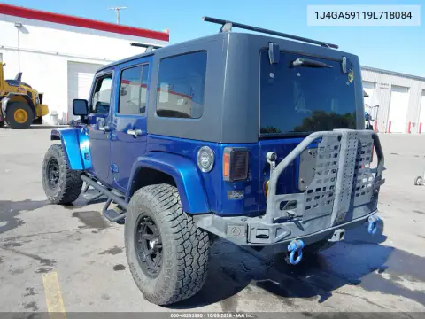 2009 Jeep Wrangler Unlimited Sahara VIN 1J4GA59119L718084 фото 3