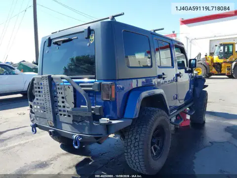2009 Jeep Wrangler Unlimited Sahara VIN 1J4GA59119L718084 фото 4