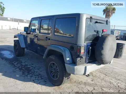 2013 Jeep Wrangler Unlimited Sport VIN 1C4BJWDG0DL582086 фото 4