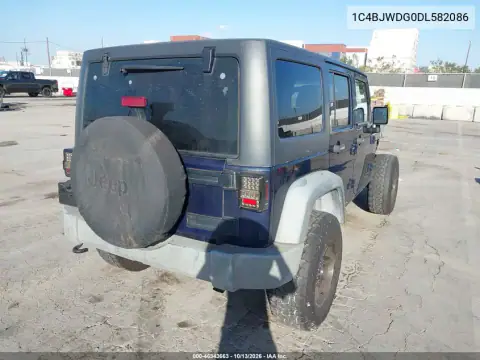 2013 Jeep Wrangler Unlimited Sport VIN 1C4BJWDG0DL582086 фото 5