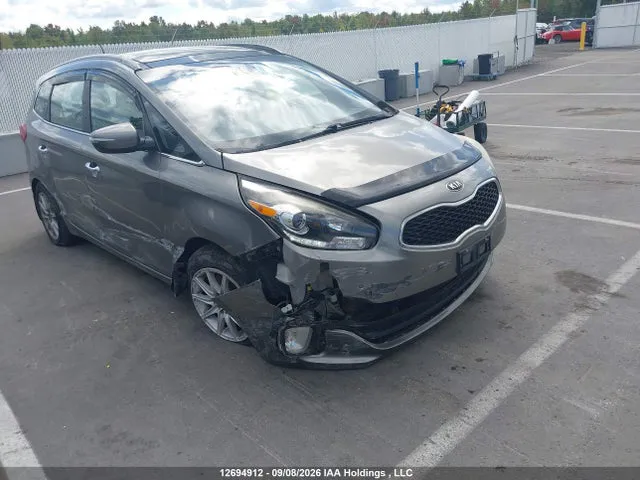 2014 KIA Rondo VIN KNAHU8A36E7021395 фото 1