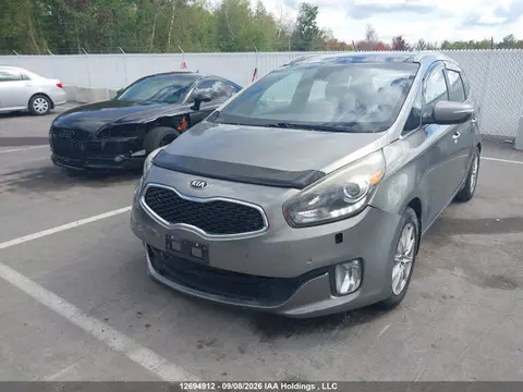 2014 KIA Rondo VIN KNAHU8A36E7021395 фото 2