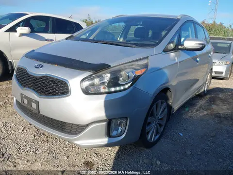 2014 KIA Rondo VIN KNAHU8A37E7030428 фото 2