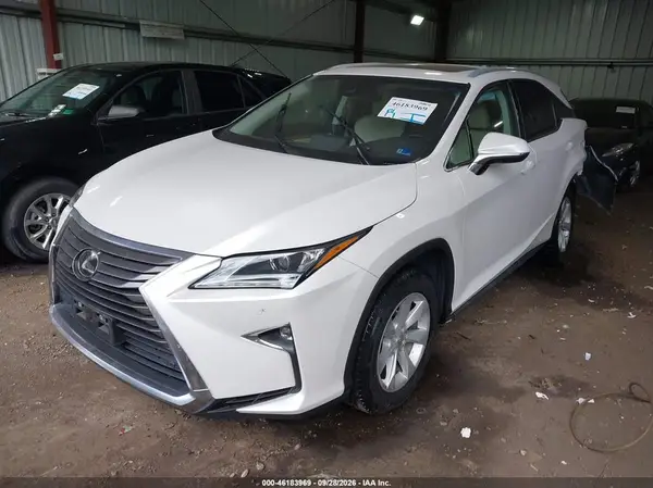 2T2BZMCA8HC129191 — 2017 Lexus RX, фото 2 с аукциона IAAI, Задняя часть слева