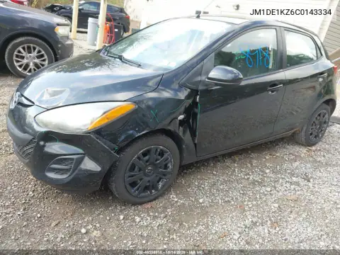 JM1DE1KZ6C0143334 — 2012 Mazda 2, фото 3 с аукциона IAAI, Передняя часть