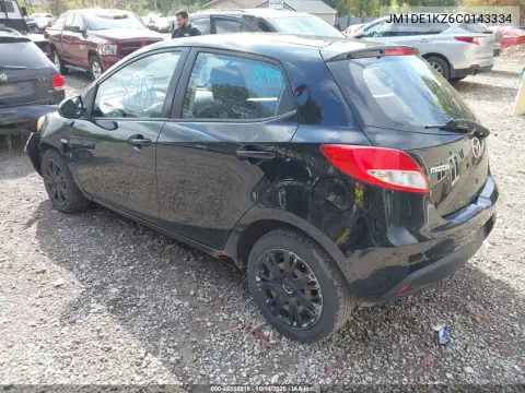 JM1DE1KZ6C0143334 — 2012 Mazda 2, фото 4 с аукциона IAAI, Передняя часть