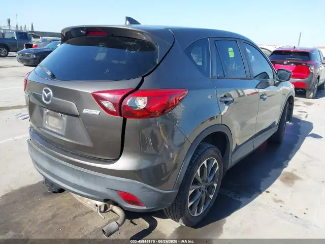 JM3KE2DY2G0850588 — 2016 Mazda CX-5 Grand Touring, фото 4 с аукциона IAAI 14.10.2026, Левый бок