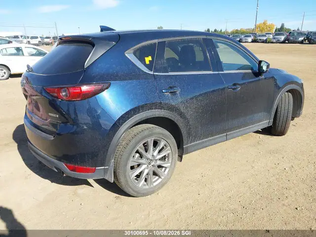 JM3KFBDM4M1118494 — 2021 Mazda CX-5 Grand Touring, фото 4 с аукциона IAAI 14.10.2026, Передняя часть слева