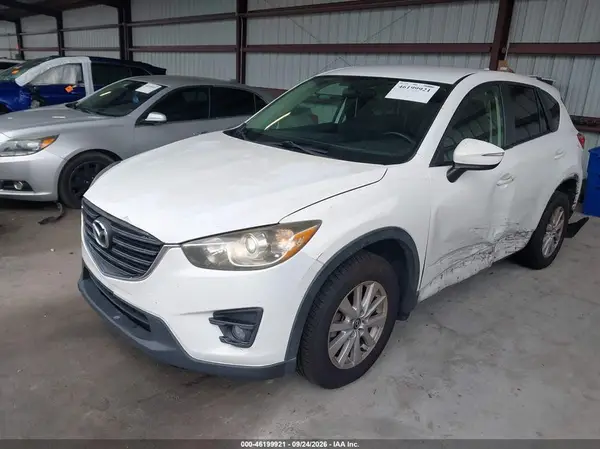 JM3KE2CY1G0602009 — 2016 Mazda CX-5, фото 2 с аукциона IAAI, Левый бок