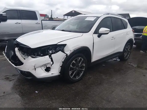 JM3KE2DY7G0735761 — 2016 Mazda CX-5, фото 2 с аукциона IAAI, Передняя часть