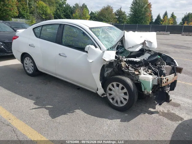 2014 Nissan Versa VIN 3N1CN7AP4EL812563 фото 1